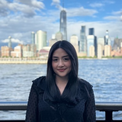 Laura Catalina Moreno standing by the New York City waterfront